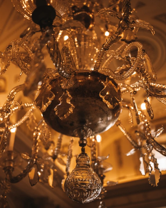 crystal chandelier hangs from ceiling in home