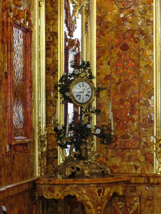 an elaborate ornate room with a large clock on it