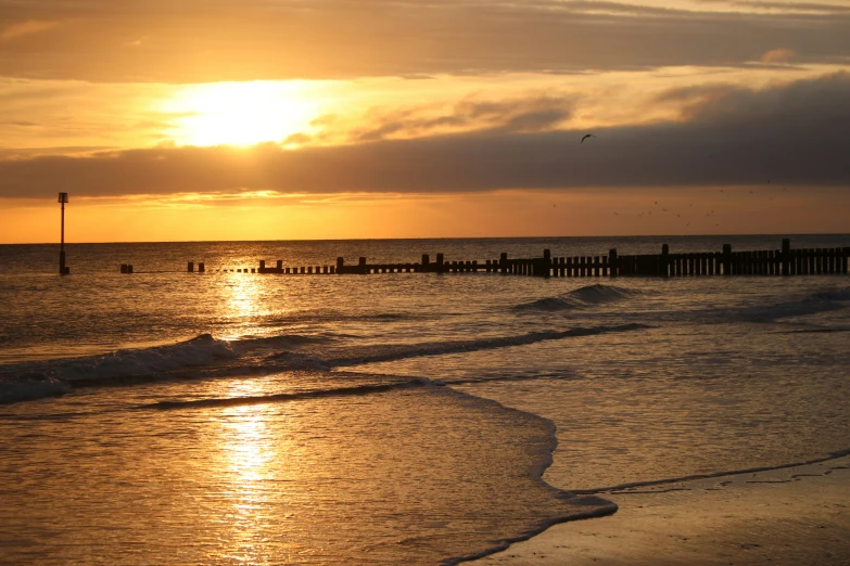 a sunset at the end of the day on the beach