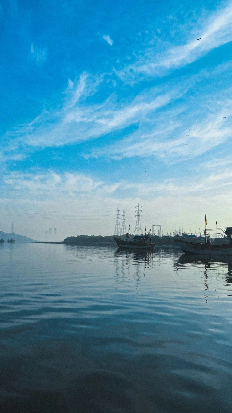 the water has many ships anchored at the shore