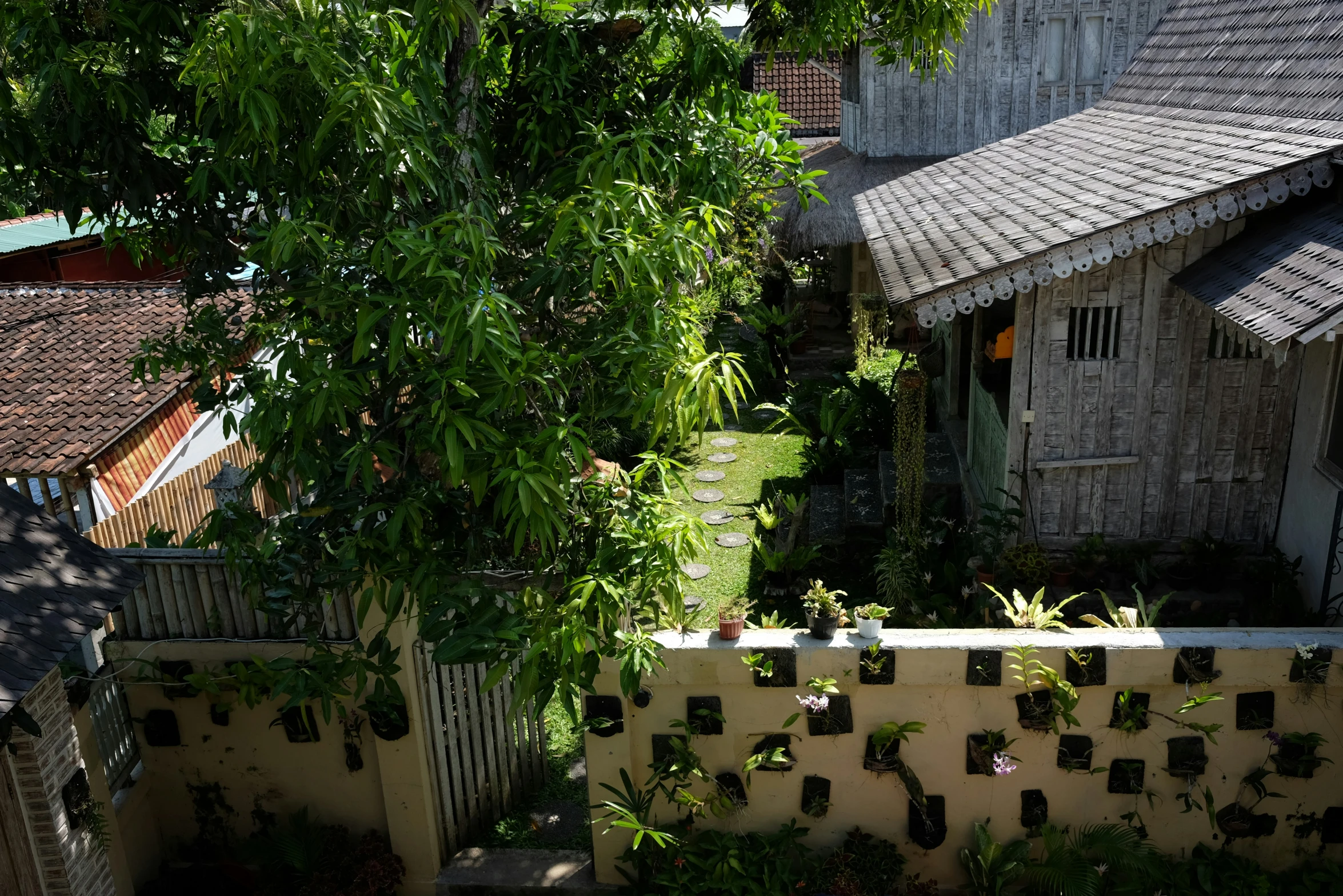 a view from the top of a building looking down at a yard