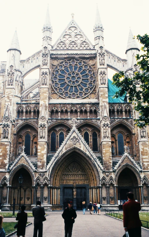 a cathedral with a group of people in front of it