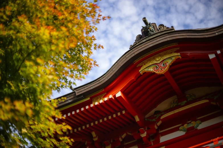 a building with the roof made up and painted red