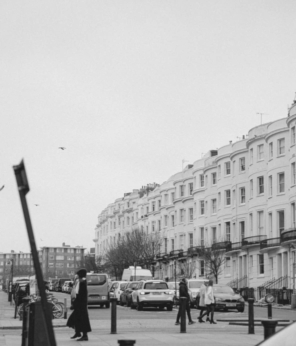 a busy city street with cars and people on it