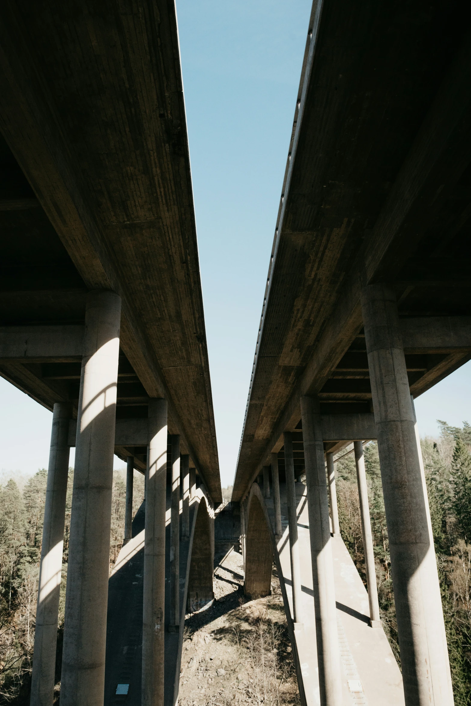 a large bridge crosses the width of the desert