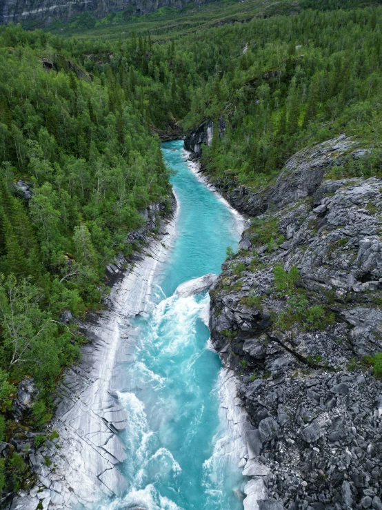 an expanse of river and mountains near the water