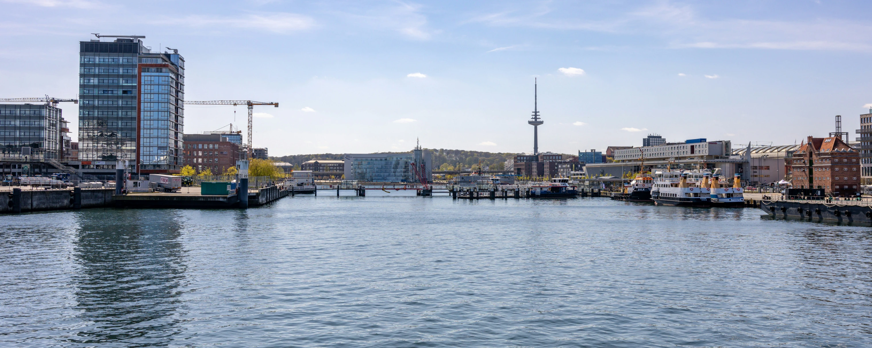 a river and a city is shown in the background