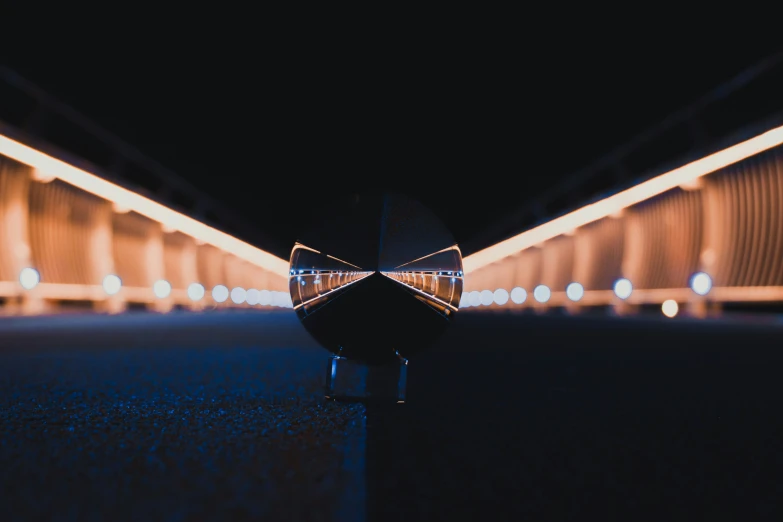 a boat with a bow sitting on top of a bridge