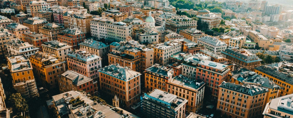 a large city with many windows and a cloudy sky