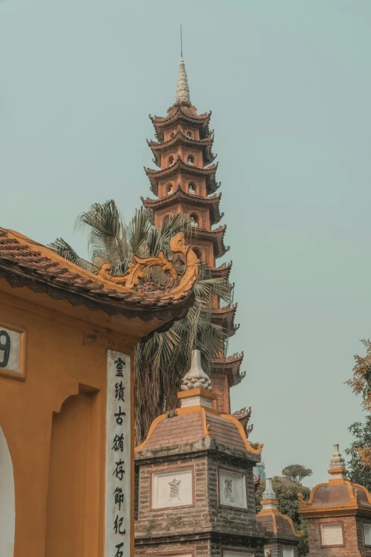 this is a view of an oriental - style temple tower in the back