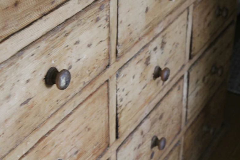 a close up view of a dresser or drawers with s