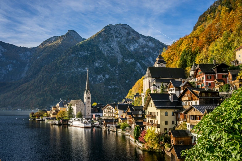 small houses on side a river in the mountains