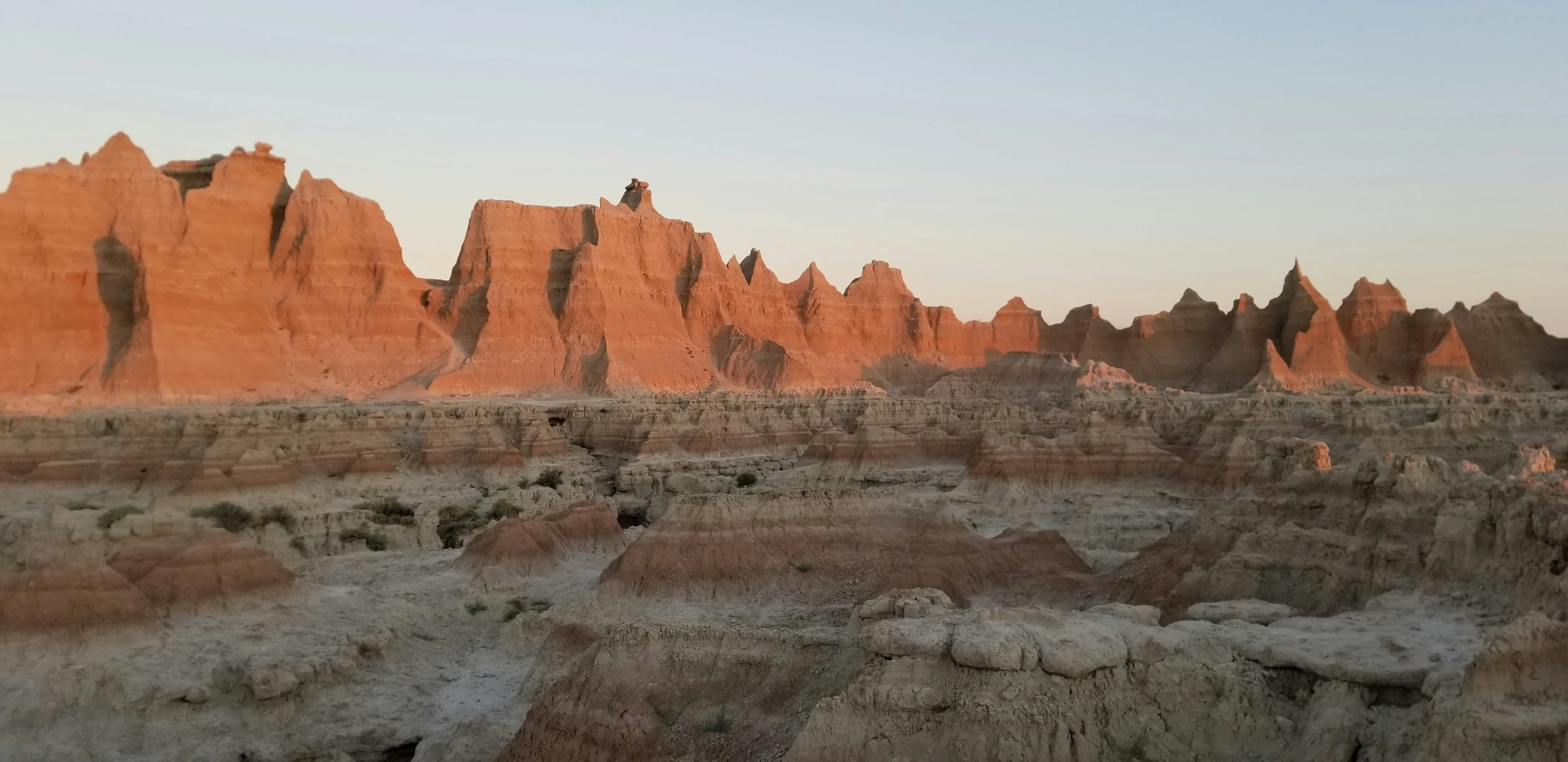 a picture of some very tall mountains that are in the desert