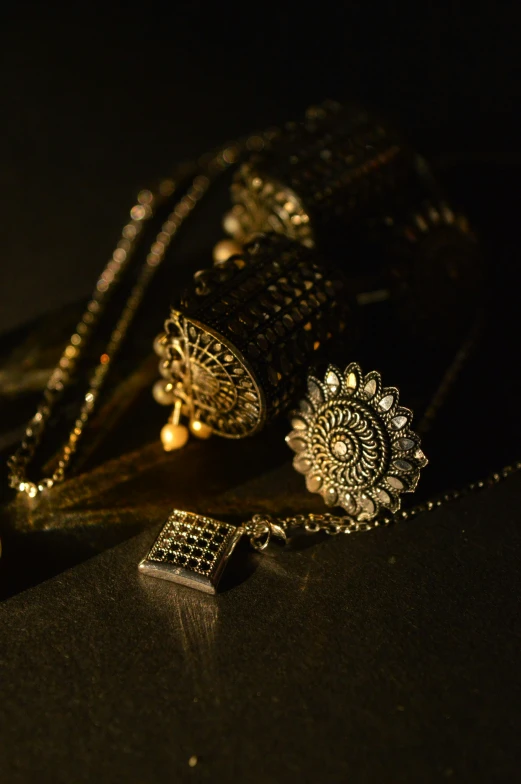 an assortment of jewelry including gold chains and ear rings