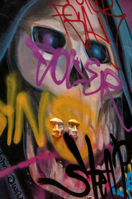 a skull is shown with colored graffiti on it