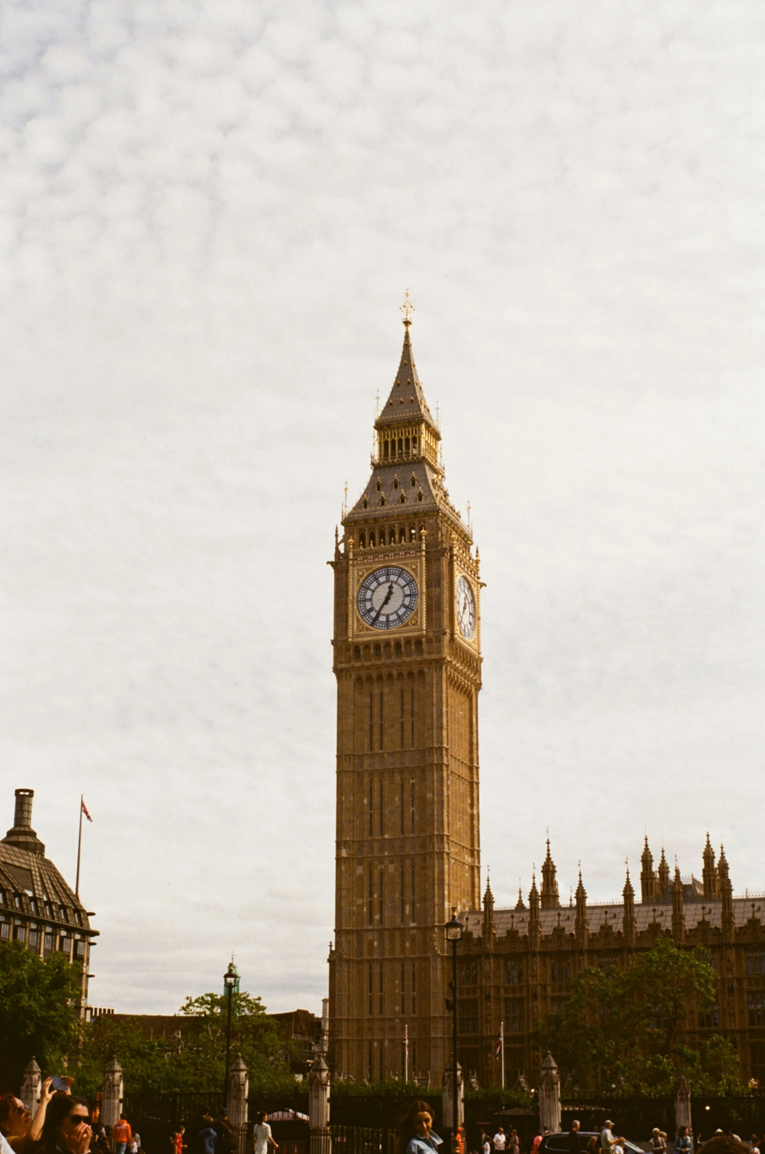 the big ben tower towering over a city of buildings