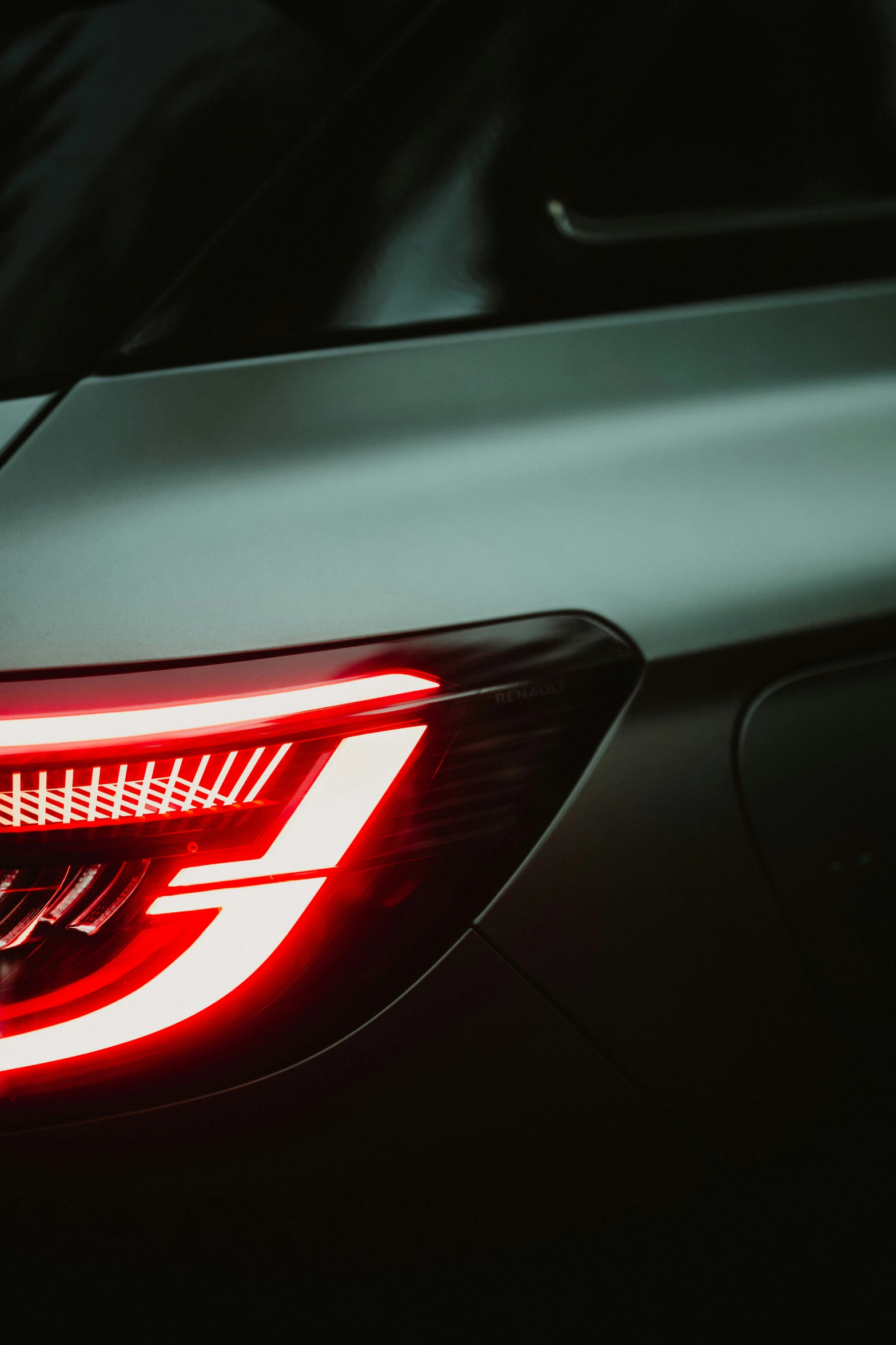 the tail lights of a sports car