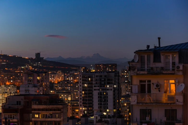 night view of city with large city skyline in foreground