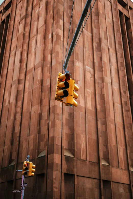 there is a traffic light that is on the wire