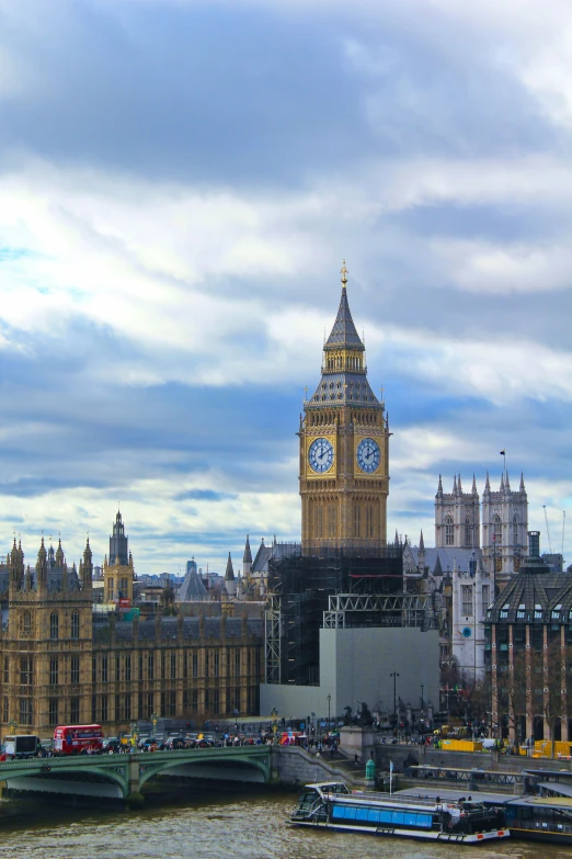 a po of the houses of parliament from across the river