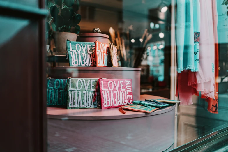 a window display with love letters and magazines