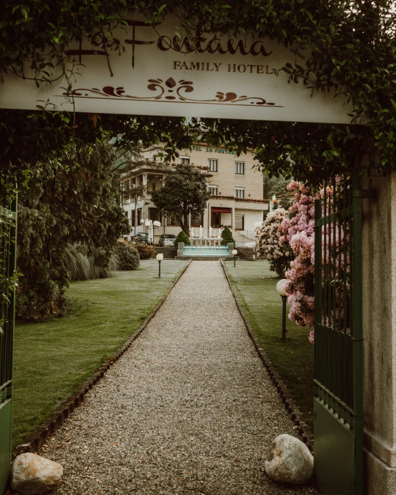 the front lawn of a very well kept resort