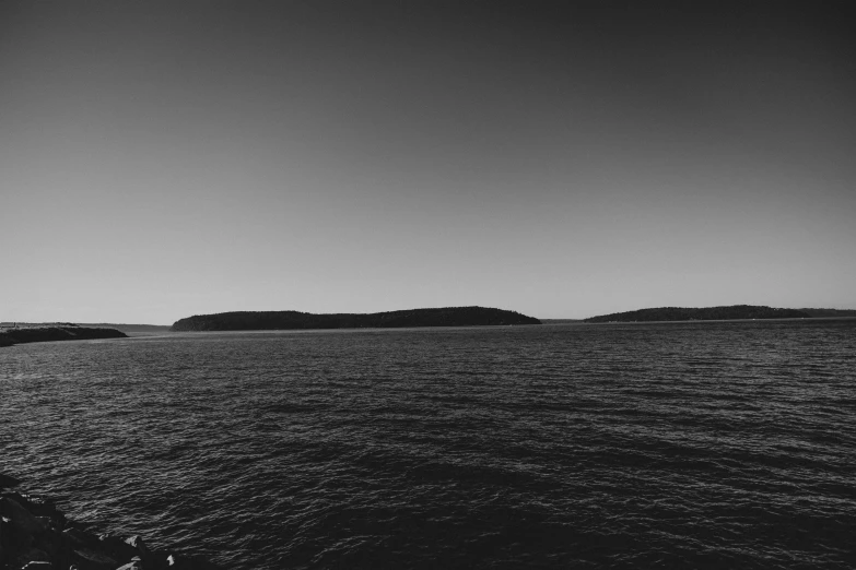 a black and white po of an island in the distance