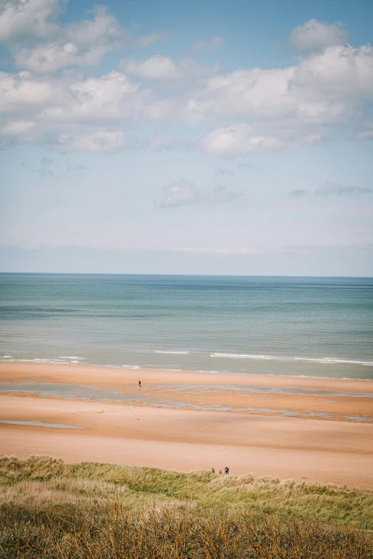 an image of the ocean from above looking at a beach