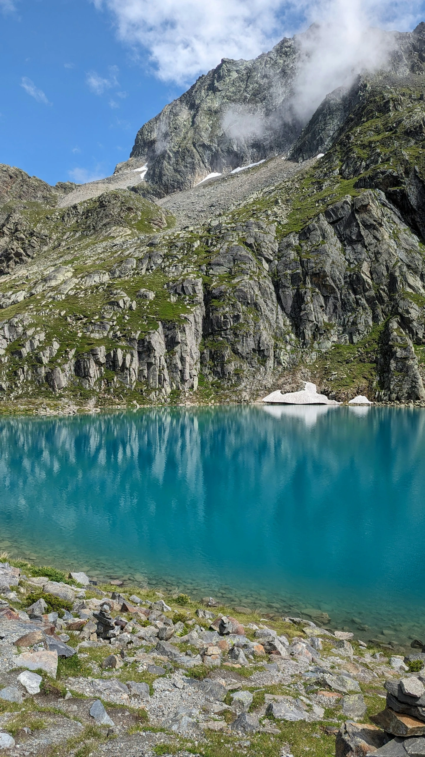 the water is incredibly blue and calm