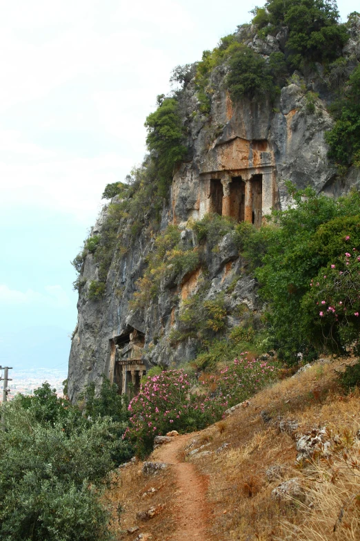 the rock has an ancient building in it