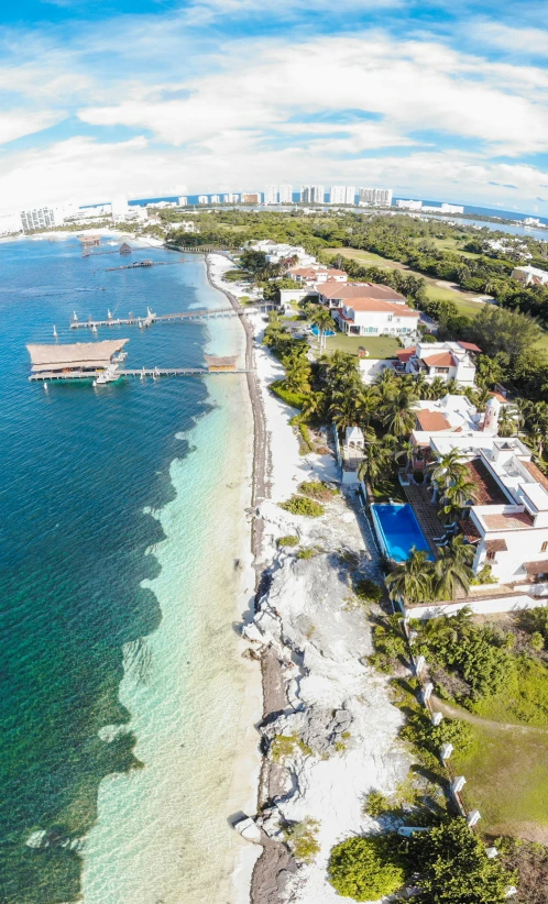 the top view of a tropical island with boats near by