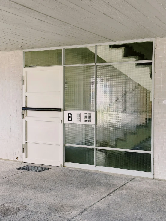 the entrance of an apartment building that is closed for business