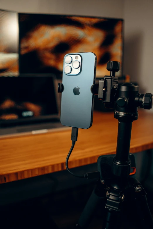 an image of an iphone on a tripod