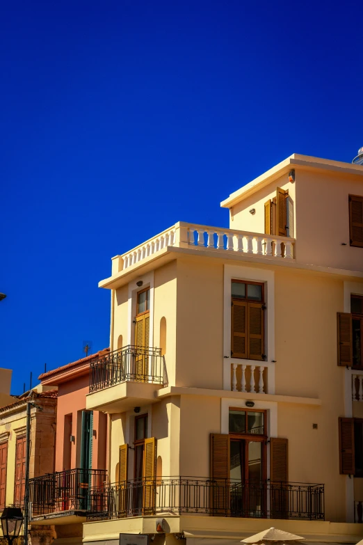 buildings line a street with windows on top