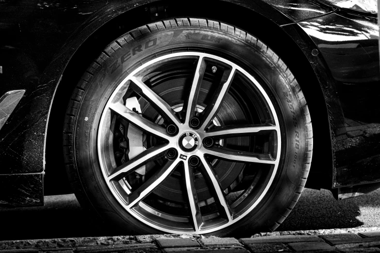 some black and white pictures of cars wheels