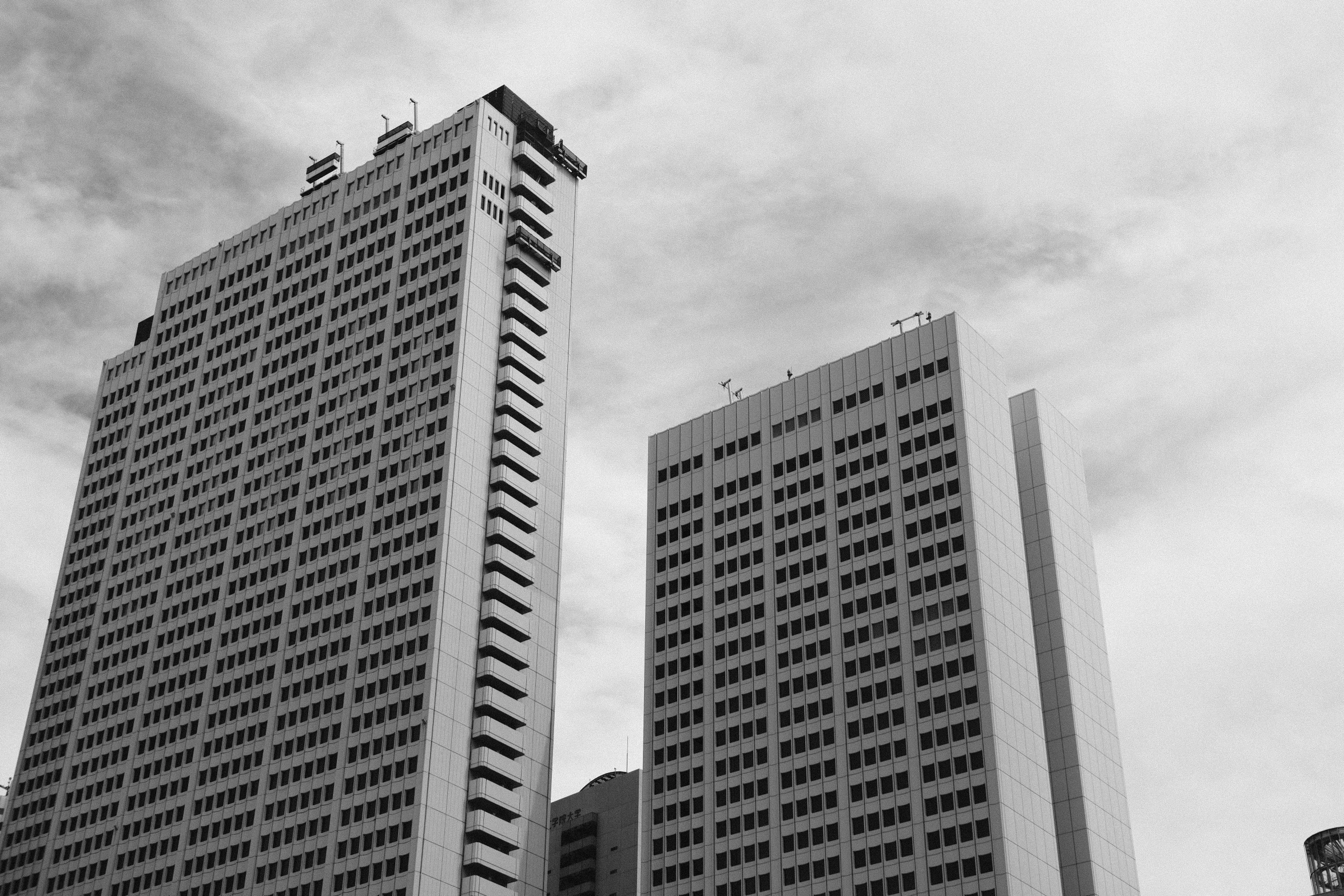 two buildings sitting in front of an intersection