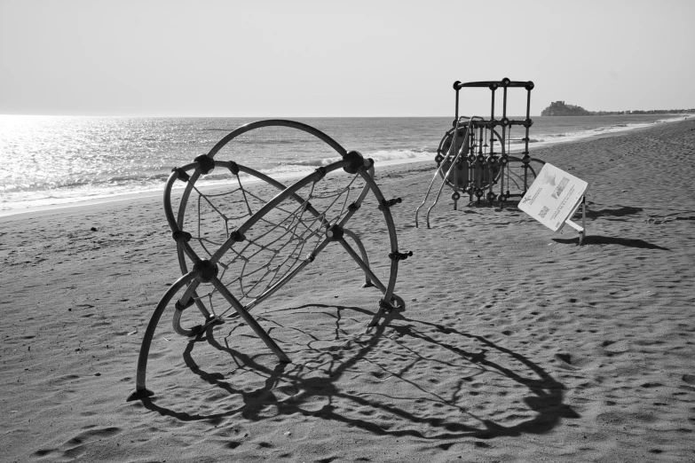 a sculpture in the sand that looks like an eye