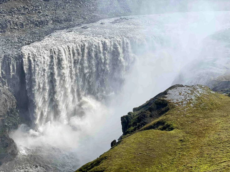 the waterfall in iceland is very large and pretty