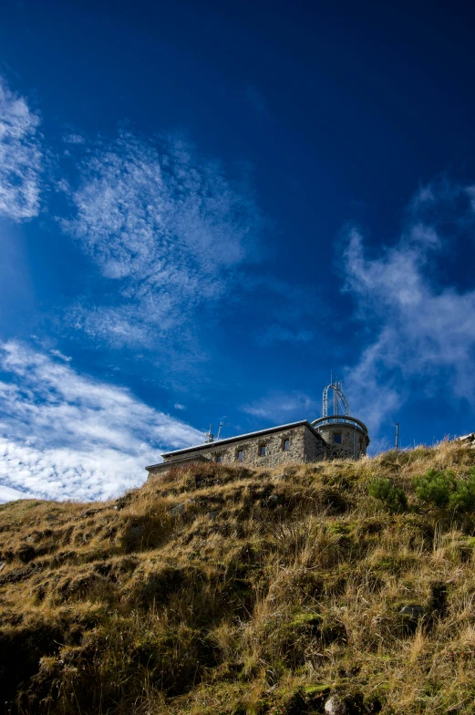 the building is on top of the hill