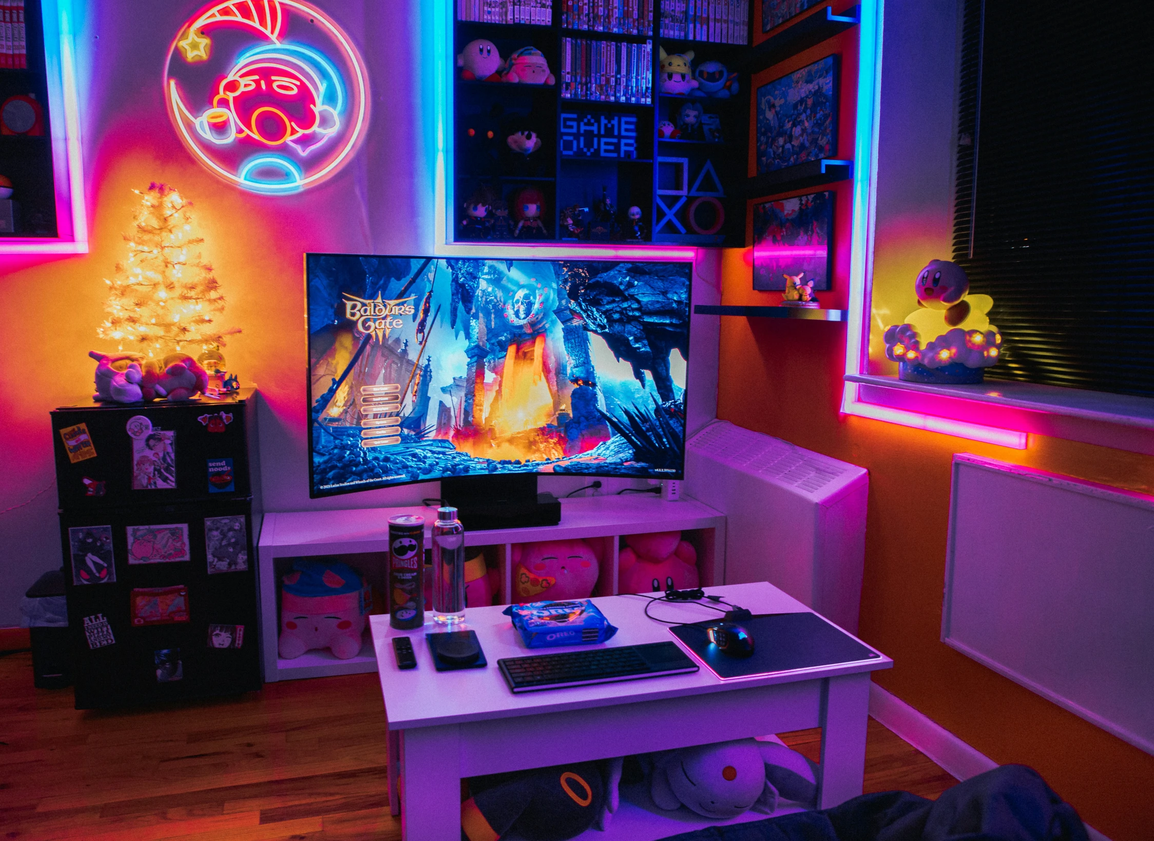 a bright room with a large television and neon lights