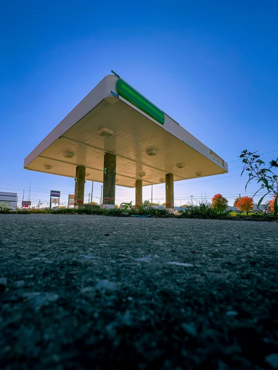 an empty gas station at night in the country