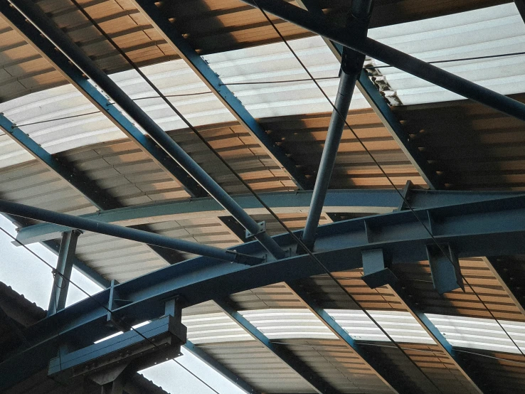 an image of an angled roof with many windows