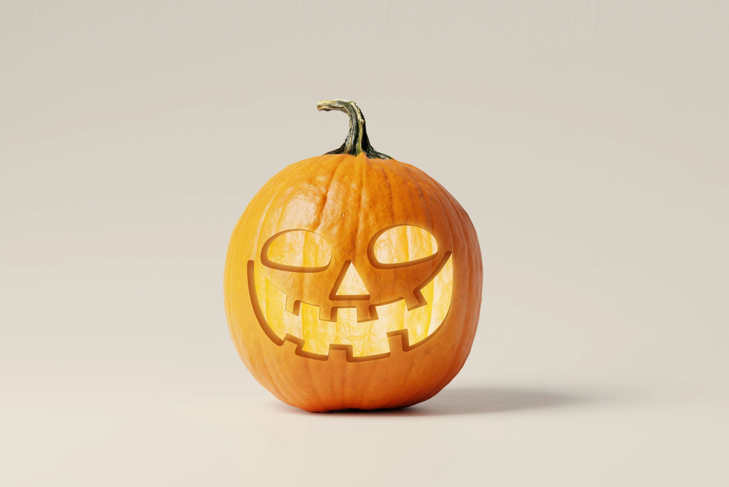 a carved pumpkin shaped with eyes and nose