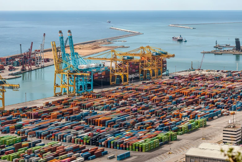 a view of a dock with many docked ships