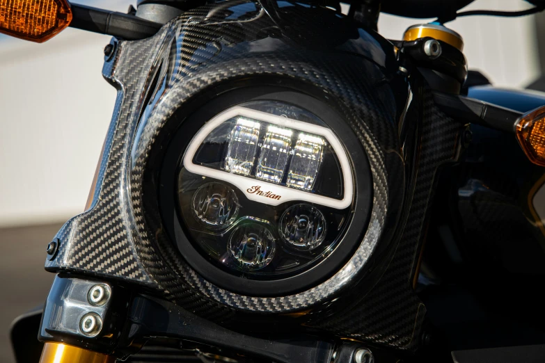 the front light on a motorcycle on a road