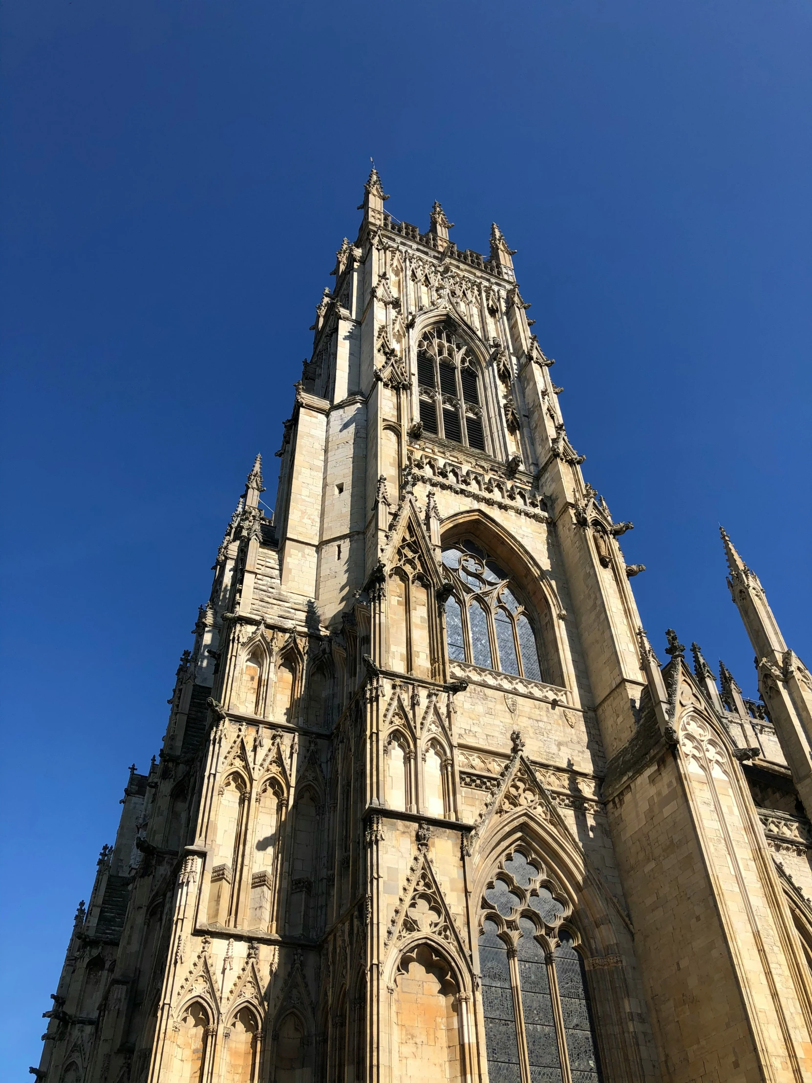 a large cathedral with a blue sky background