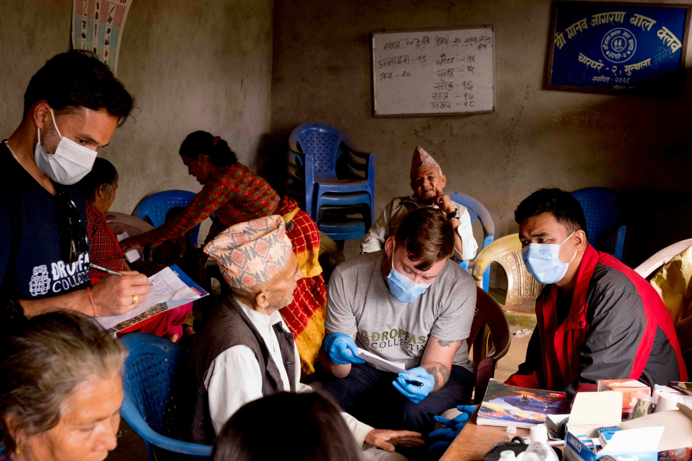 many people with surgical masks are gathered together