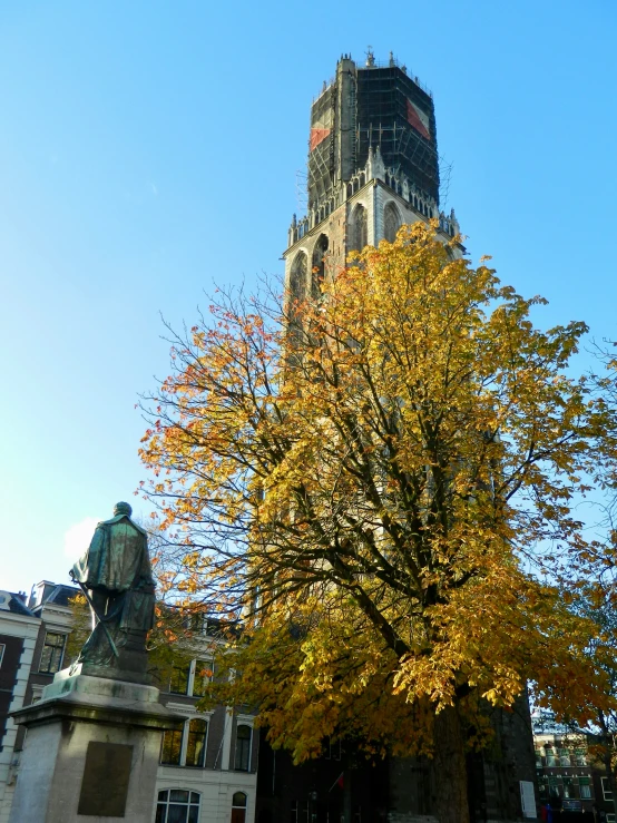 the view of a very tall building from below