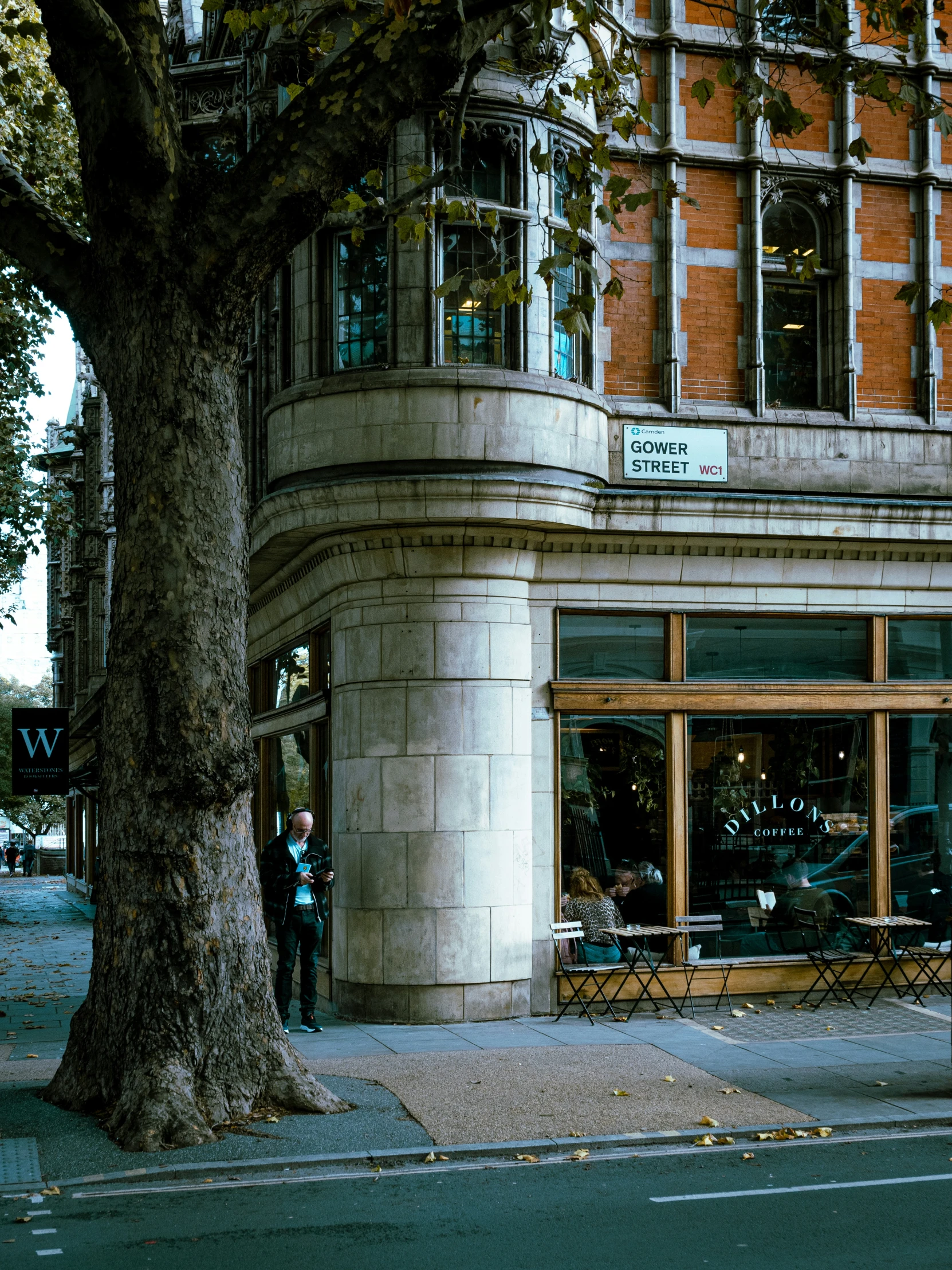 a city street with an old brick building