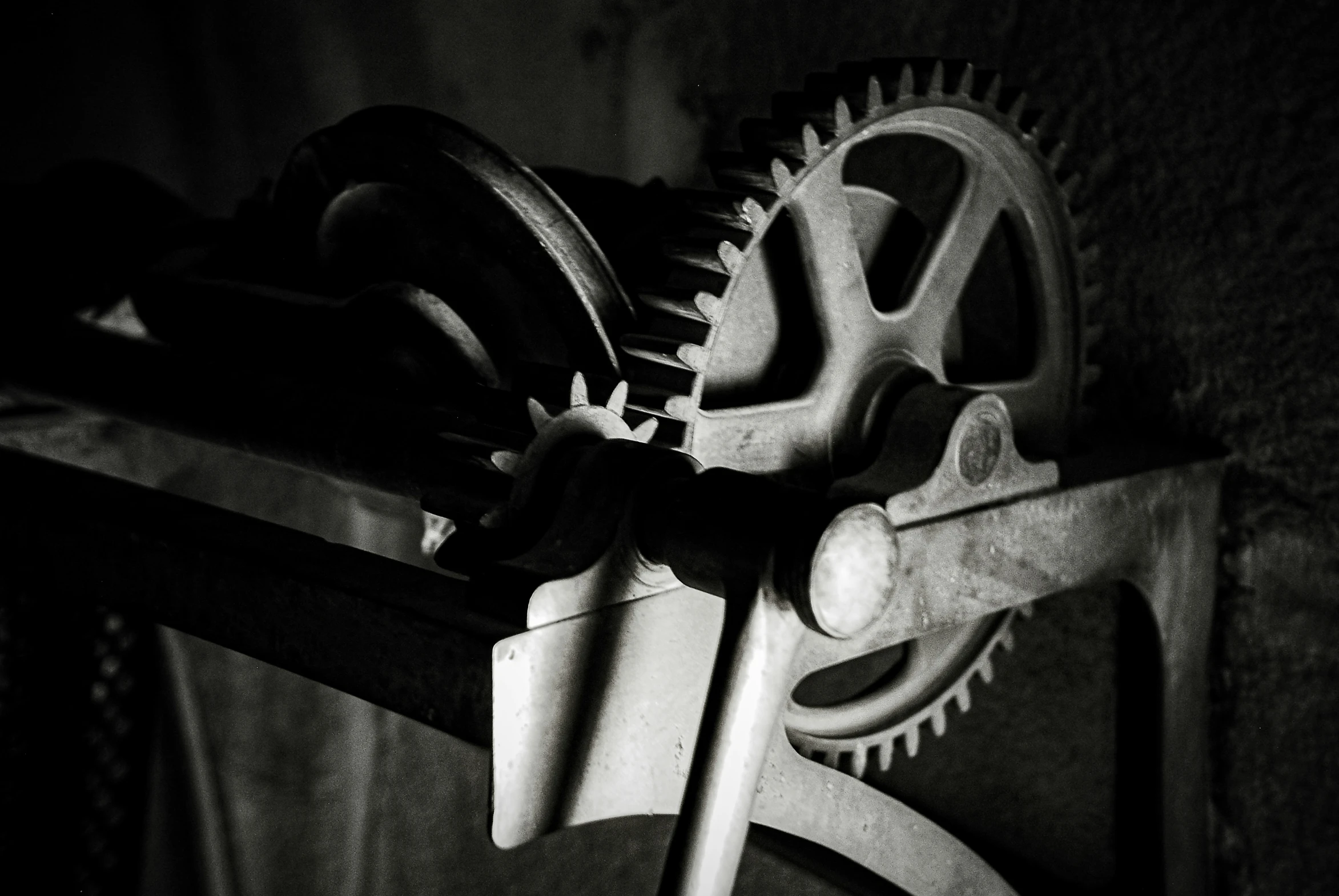 the gears of a machine in black and white